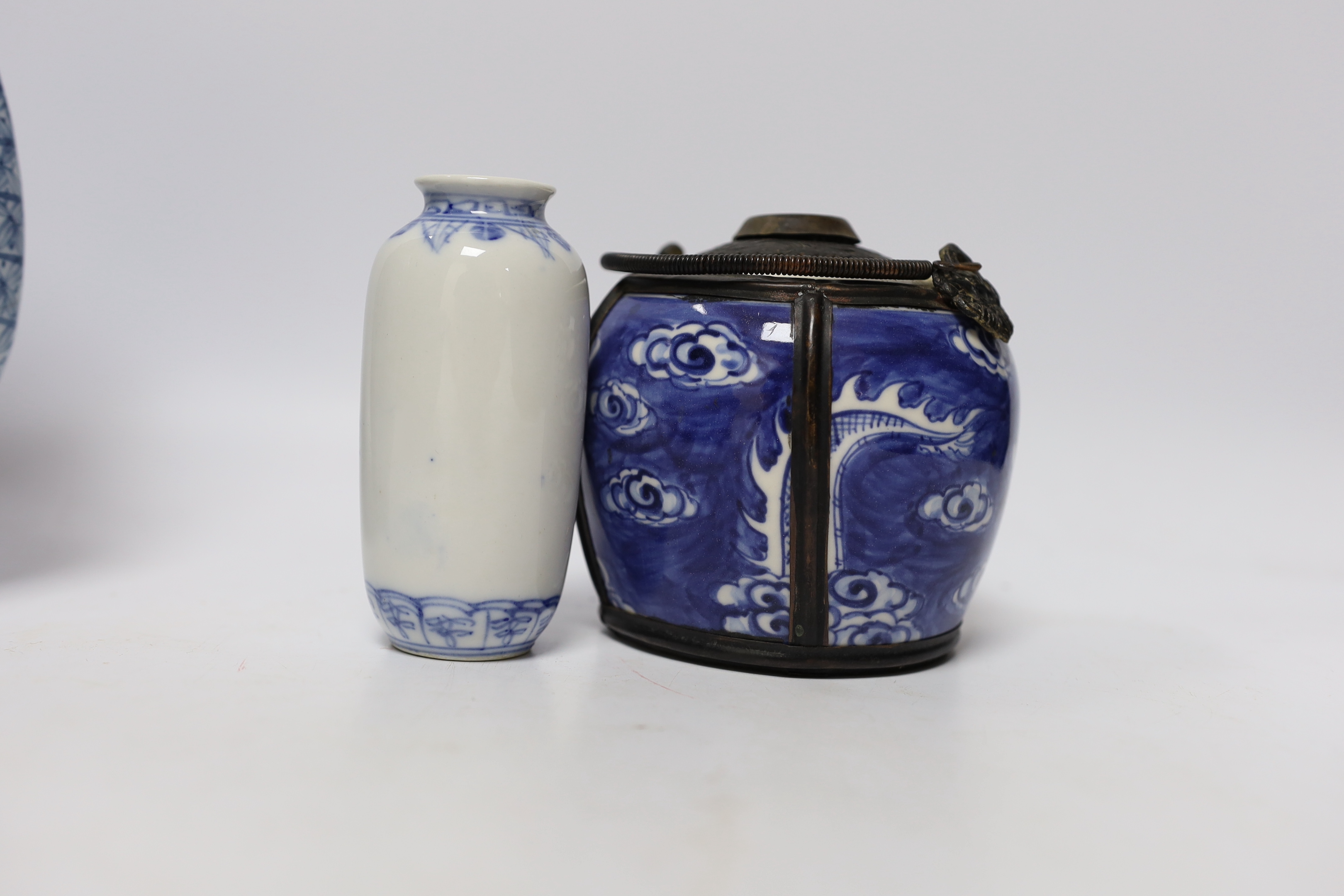 Four pieces of Chinese blue and white porcelain including a 19th century ‘dragon’ bowl, tallest 19.5cm